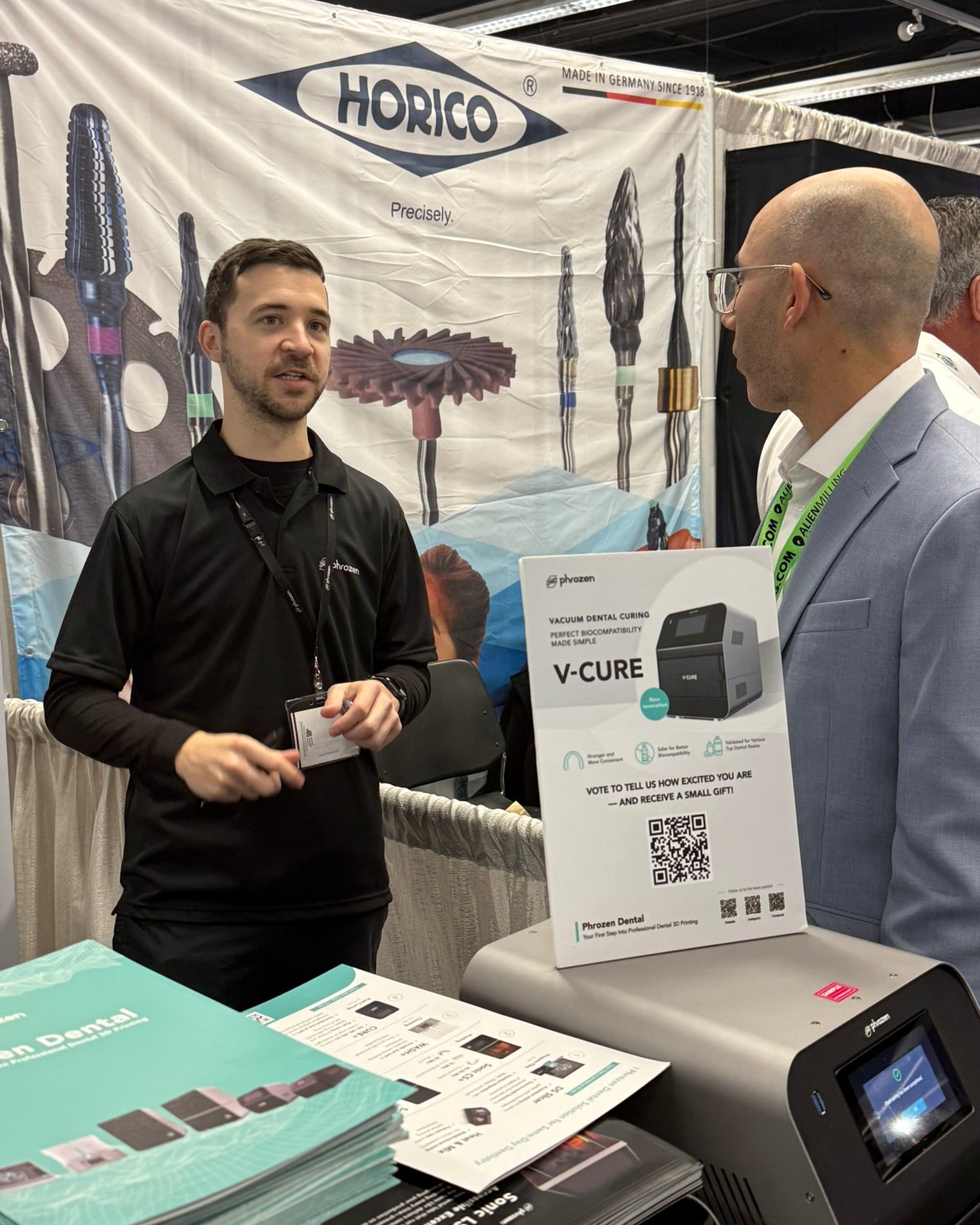 Dental professionals learn about V-CURE at the Phrozen Dental booth during LMT LAB DAY 2026. The new vacuum curing solution generated strong interest for its simplified workflow and support for biocompatible dental applications.